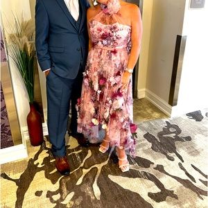 Marchesa Notre 2022 high low gown with hand sewn 3D floral embellishments.